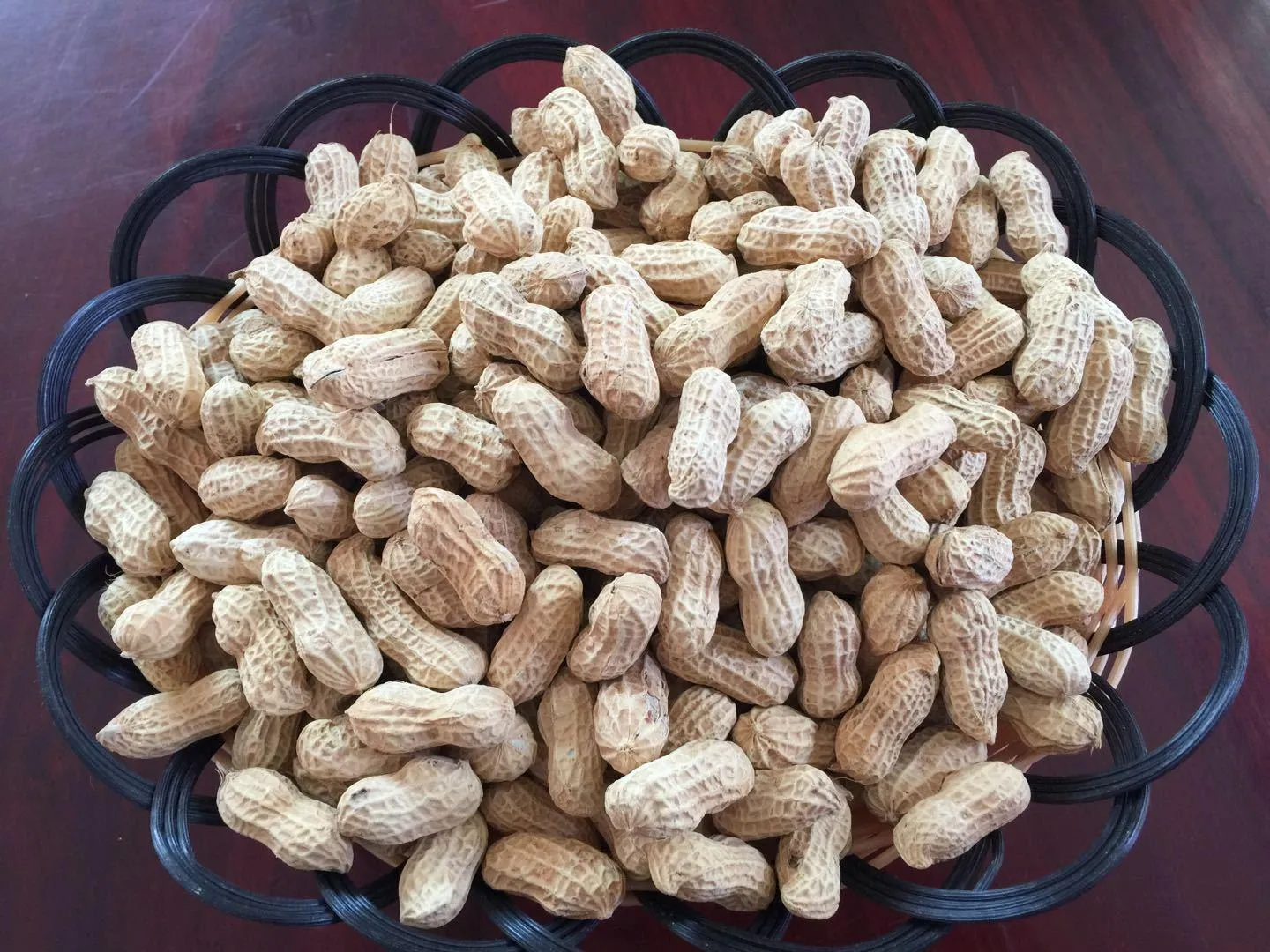 Various Chinese peanut snacks - roasted, fried, and boiled peanuts served in traditional settings